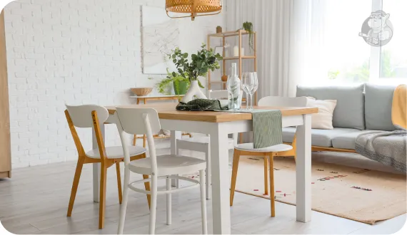 dwa rodzaje krzeseł przy białym stole